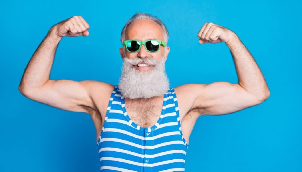 BillionGraves, Close-up portrait of proud sportive cheerful cheery gray-haired man trainer instructor showing biceps isolated on bright vivid shine turquoise blue green background