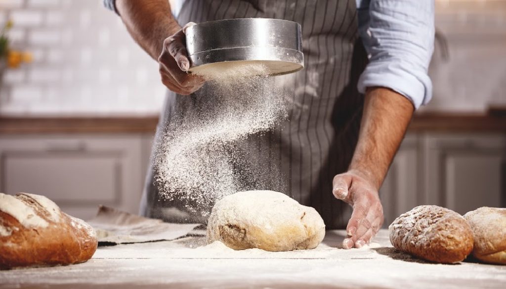 hands of the baker's male knead dough, heritage food, family history, genealogy, BillionGraves, ancestors, cemetery, gravestones, BG, family vacation, genealogy trip