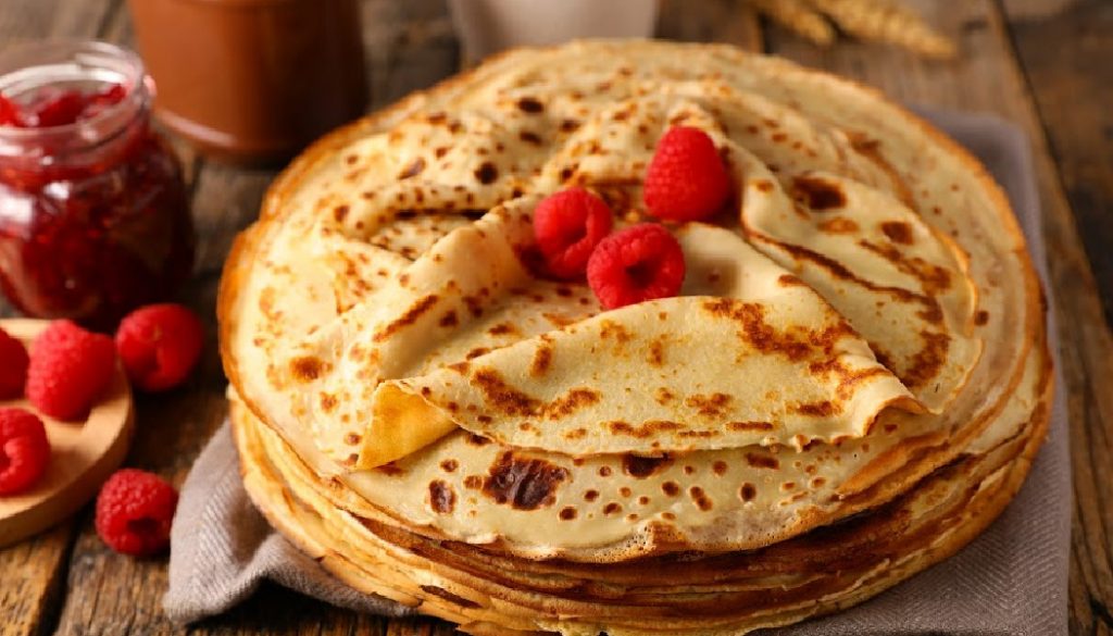 stack of crepes with raspberry and chocolate; heritage food, family history, genealogy, BillionGraves, ancestors, cemetery, gravestones, BG, family vacation, genealogy trip
