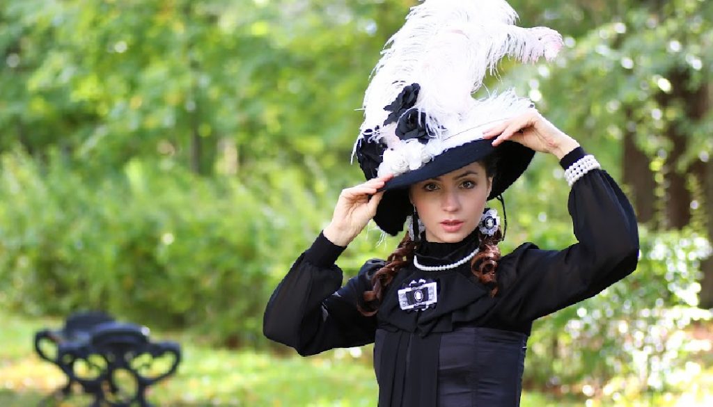 white ostrich feathers, black hat