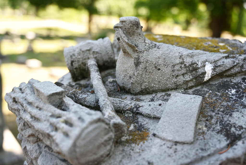 maul, hammer, ax, dove, BillionGraves, Woodmen of the World, Treestones, tree gravestones, grave, gravestones, cemetery, family history, genealogy, ancestors, Woodmen of America, BillionGraves app, volunteer, gravestone symbols