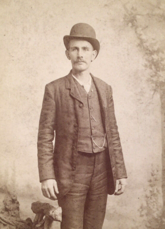 bowler hat, BillionGraves, cemetery, family history, ancestors, ancestry. BG, BG+, research, genealogy, family, graves, gravestones, headstones, photos, family photos, BillionGraves, old family photos, suit, man